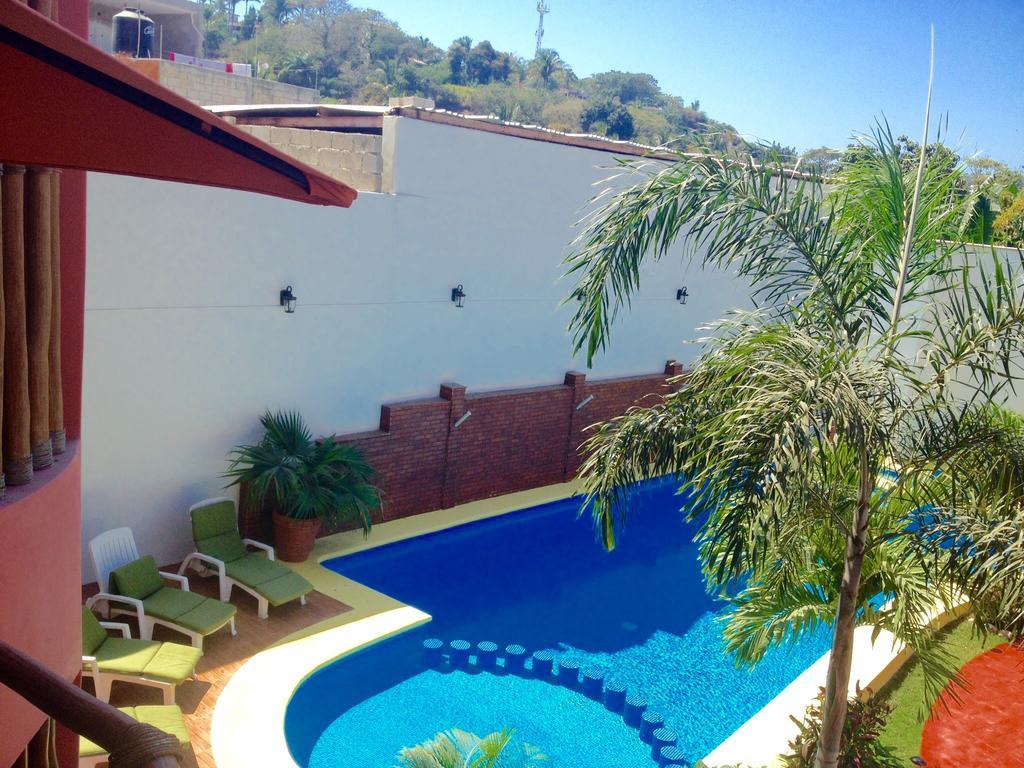 Hotel Y Suites Los Encantos 萨尤利塔 外观 照片
