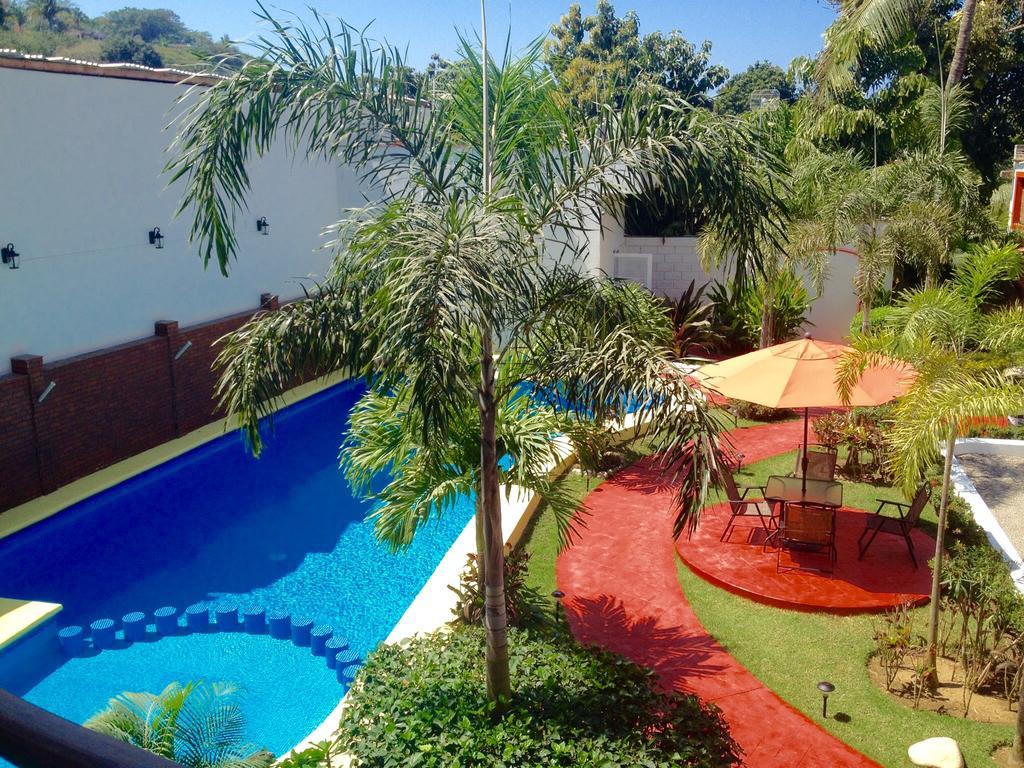 Hotel Y Suites Los Encantos 萨尤利塔 外观 照片